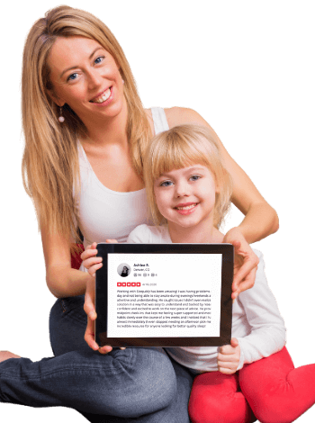 Image of mother and daughter holding a sleep coach review for Sleepably